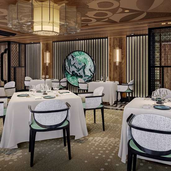 The interior of an elegant Japanese restaurant with white table décor 