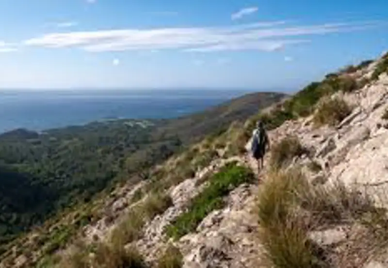 Hike the Talaia Trail to Faro de la Plata