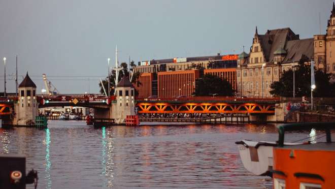Explore a grand Polish port city of green boulevards and a restored ducal castle.