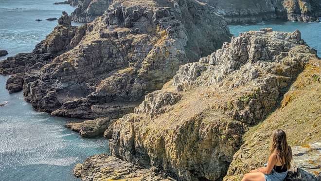Step back in time on a car-free Channel Island of lanes, cliffs and dark night skies.