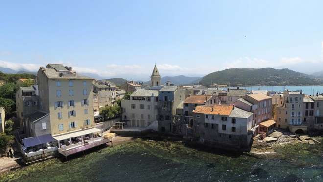 Relax in a chic Corsican port beneath vine-clad hills and crystal-clear waters.