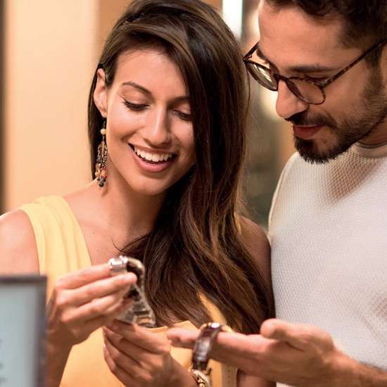 Two people shopping for a watch