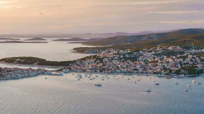 Visit a postcard-perfect Croatian town set on a small peninsula crowned by a church.
