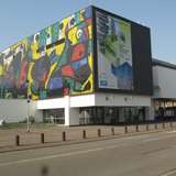 An image of a modern image with a colourful mosaic on one wall