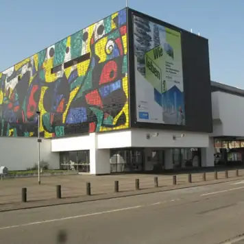 Image related to An image of a modern image with a colourful mosaic on one wall