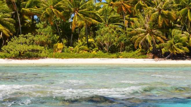 Step ashore on a tiny, picture-perfect islet in a sparkling Polynesian lagoon.