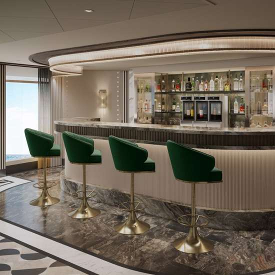 A stylish bar with green stools