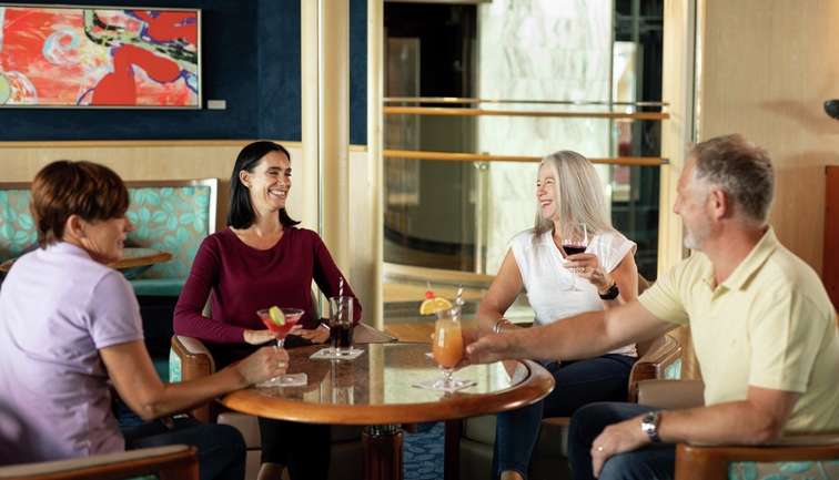 Friends enjoying a drink in the bar