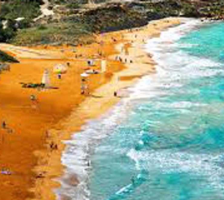 Sunbathe at Ramla Bay