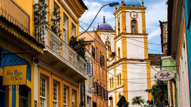 Explore one of Brazil's oldest towns, a colourful colonial port on a scenic island.