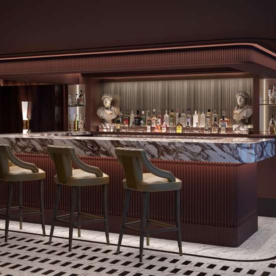 A stylish brown bar with small statuettes at either end