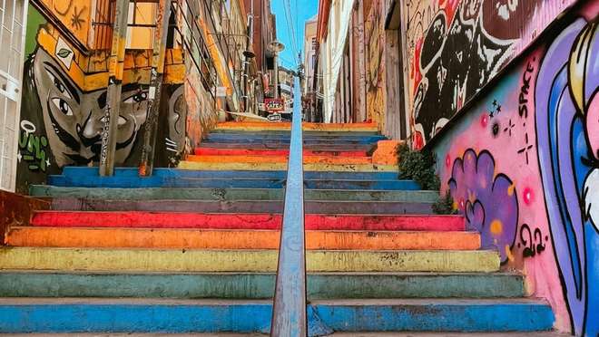 Explore a bohemian Chilean port city of colourful hills, funiculars and street art.