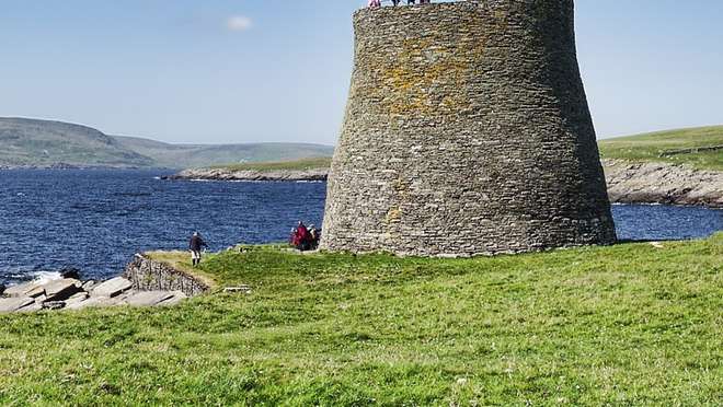 Step ashore to explore the world's best-preserved Iron Age broch on a tiny Shetland isle.