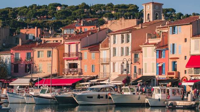 Discover a picture-perfect Provençal fishing port beside the spectacular Calanques cliffs.