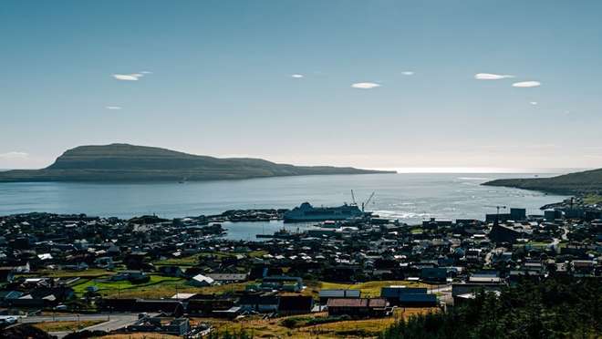 Visit the southernmost Faroe island, ringed by spectacular cliffs and sea stacks.