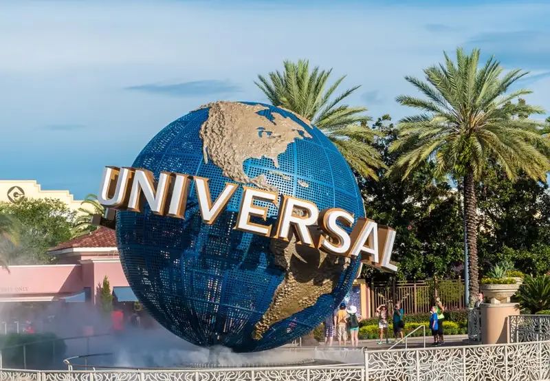 Universal Orlando Resort - the universal globe in a fountain in the sunshine