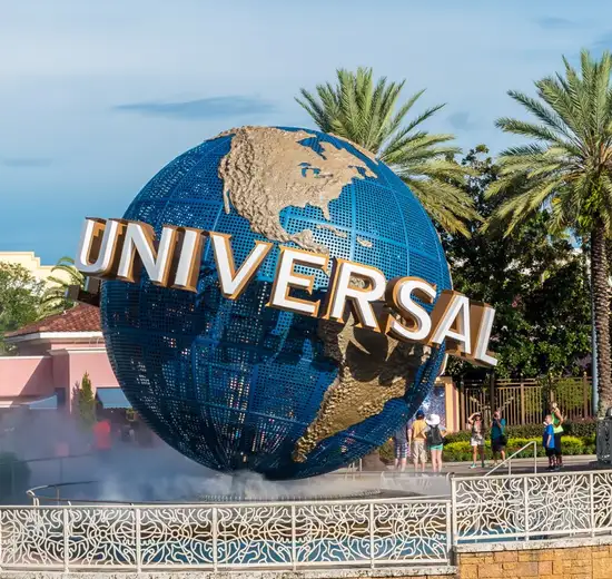 Image related to Universal Orlando Resort - the universal globe in a fountain in the sunshine