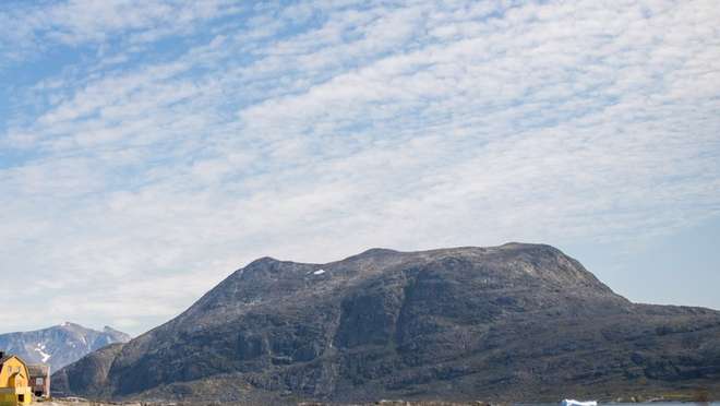 Cruise through a region of emerald valleys, Norse ruins and iceberg-filled fjords.