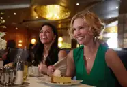 Two people enjoying a dessert in Pinnacle Grill