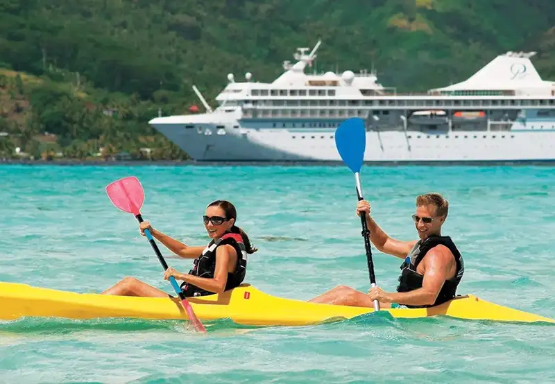 guests paddleboarding 