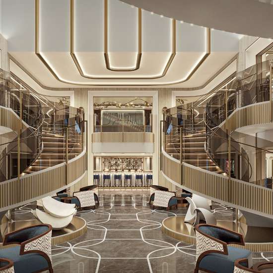 A stylish atrium space with bright lights and two spiral staircases