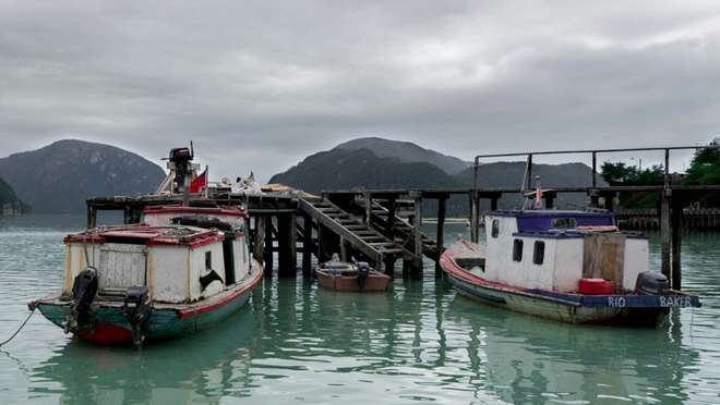 Discover a unique Patagonian village built entirely on cypress-wood walkways.