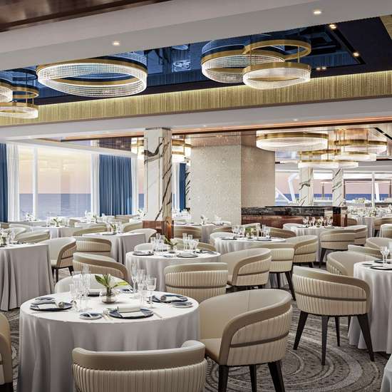 The interior of an elegant restaurant with white tablecloths and cream-coloured chairs
