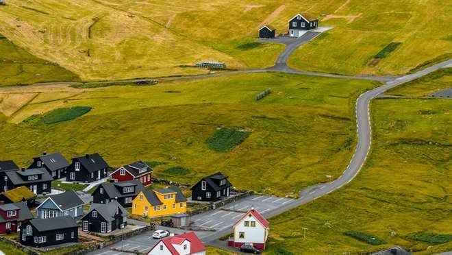 Explore a friendly village on Suðuroy, gateway to some of the Faroes' finest cliffs.