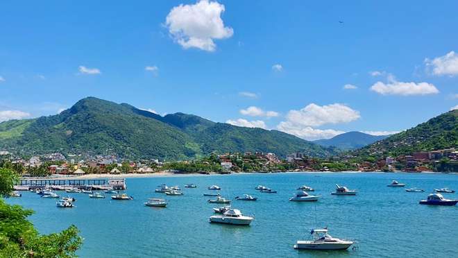 Discover a charming Mexican fishing town beside golden beaches on the Pacific coast.
