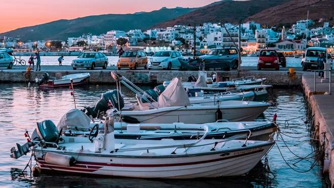 Explore a Cycladic island of marble villages, dovecotes and a revered pilgrimage church.