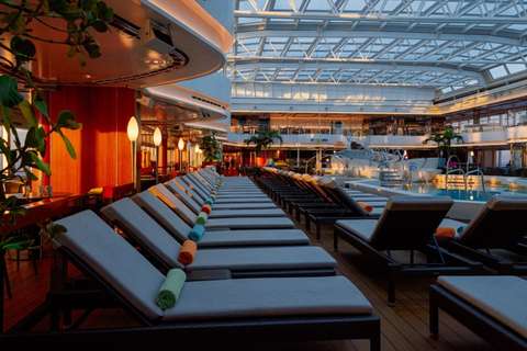 Image related to A row of loungers beside the Lido Pool