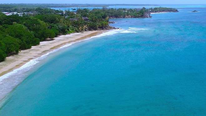 Discover a sleepy fishing village beside one of Tobago's most beautiful bays.